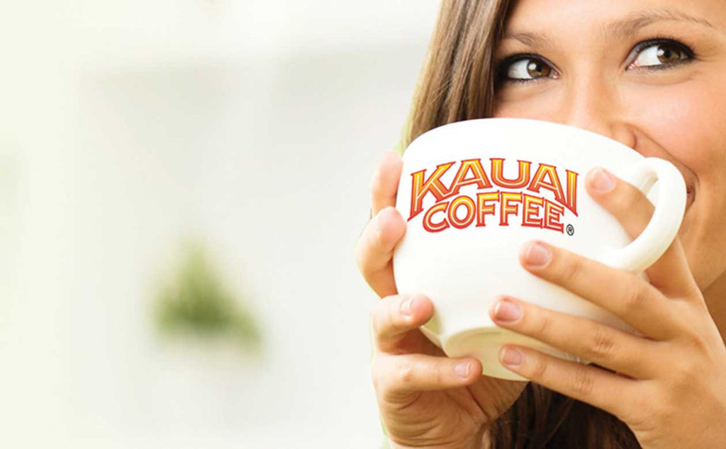 woman drinking coffee from large kauai coffee mug,